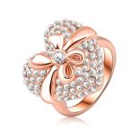 Rózsaaranyozott szív forma masnival átkötve mintás gyűrű cirkónium Austria kristály