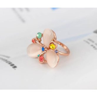   Látványos party gyűrű holdkővel és színes kristályokkal virágformában