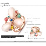 Látványos party gyűrű holdkővel és színes kristályokkal virágformában