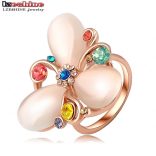 Látványos party gyűrű holdkővel és színes kristályokkal virágformában