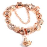 Rózsaarany színű karkötő - a tenger ihlette mintákkal - pezsgőszínű kristályos üveg és fém charm -  Pandora stílusú karkötő