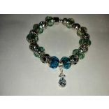 Ezüst színű, tengerszín üvegkristály (kék és halvány zöld), fém charm Pandora stílusú karkötő