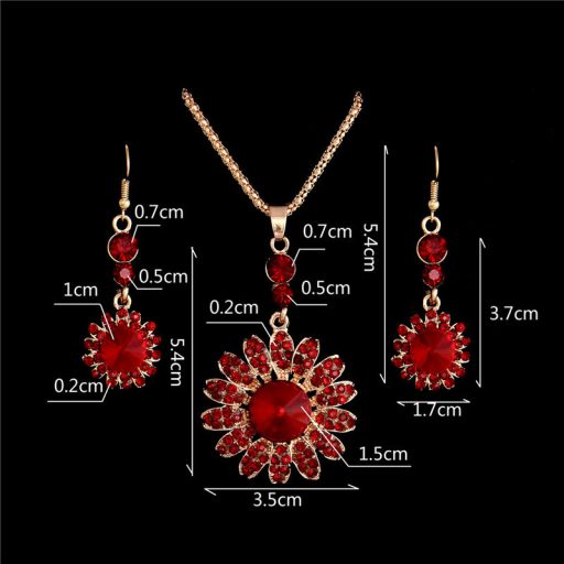 Aranyozott nyaklánc,fülbevalókkal bordó-piros kristályokkal