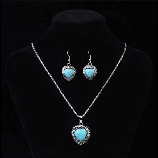 Ezüstözött kígyóbőr jellegű, türkizzel mintázott nyaklánc és fülbevaló szett