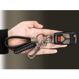 Kulcstartó, távirányító fonott bőr telefonszámmal, karabineres