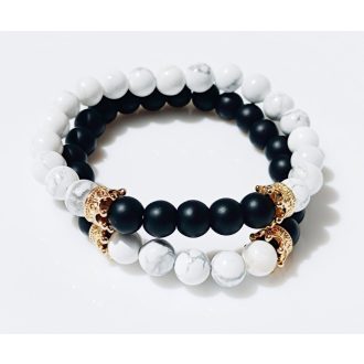   Páros ásvány karkötő ónix, howlit, arany színű koronákkal 2 db-os szett