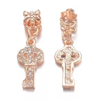 Arany színű, kristályberakásos kulcs alakú függő