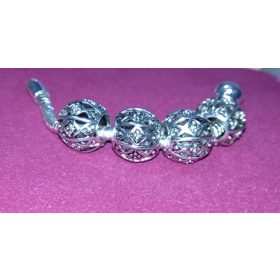 Fém charm