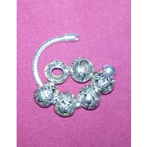 Fém charm