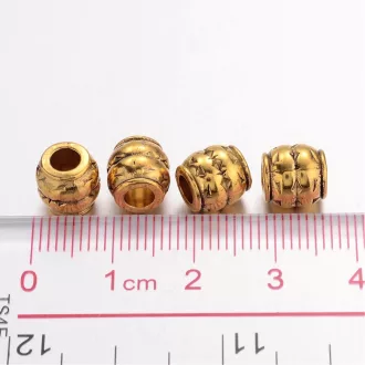 Fém, arany színű, hordó formájú charm