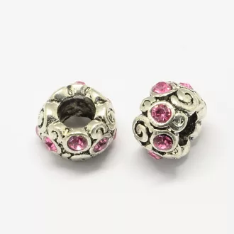   Kacskaringó mintás, színezett üvegkristállyal díszített fém charm - magenta